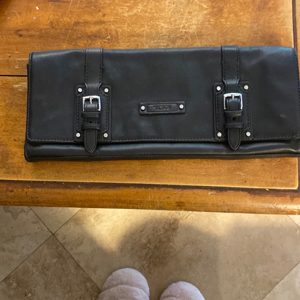 Tumi clutch